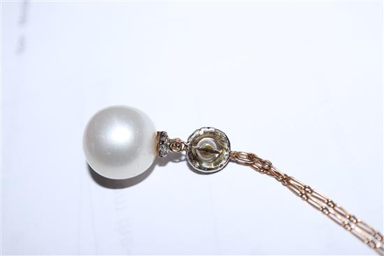 A yellow metal, rose cut diamond and cultured pearl set drop pendant, on a yellow metal chain, pendant approx. 28mm.
